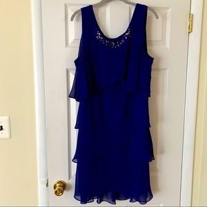 Elegant Blue Midi Dress with Embellished Neckline